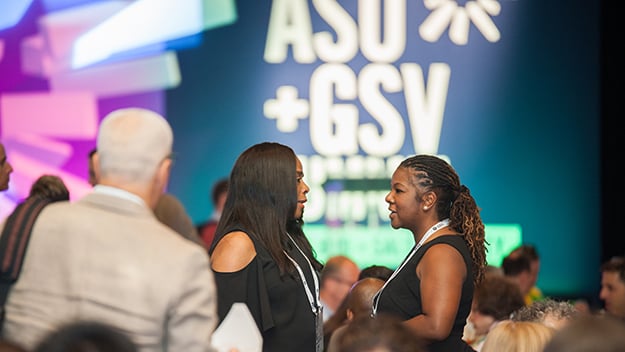 Attendees meeting at the summit.